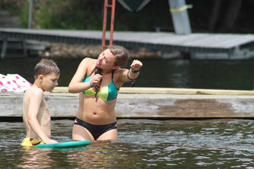 Camper getting a swimming lesson at Arrowhead Camp