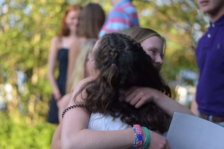 Hugs at the awards ceremony at Arrowhead Camp.