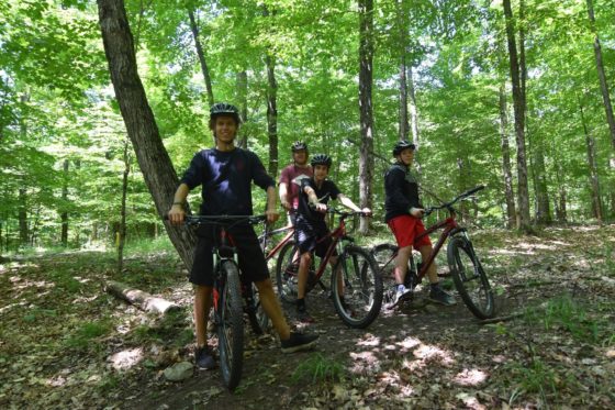 A group of campers out mountain biking at Arrowhead Camp