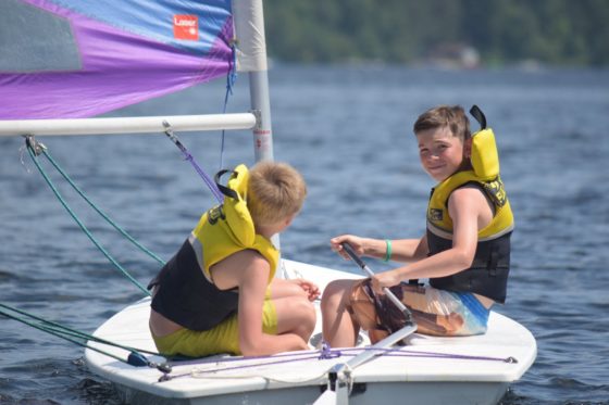 Two campers going sailing at Arrowhead Camp.